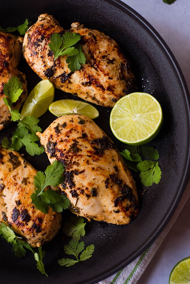 Skillet filled with an easy cilantro lime chicken breast recipe for how to meal prep chicken.